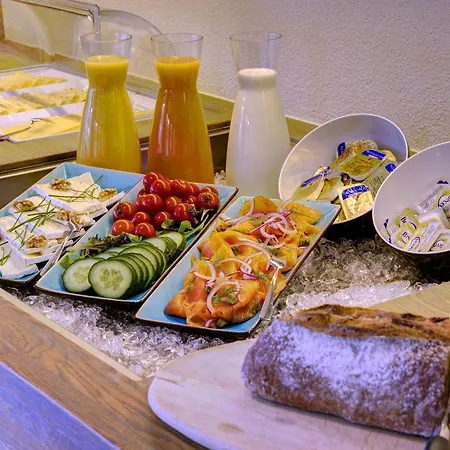 De Maasparel Nextdoor Maassuites 4* ארקן